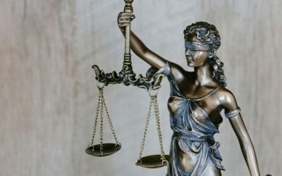 People reviewing financial documents and debt management options in Manchester